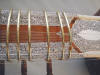 Lower neck showing scalloped inlay on sitar