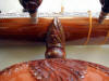 Carved tumba mount
