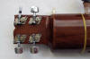 geared tuners on back of sitar